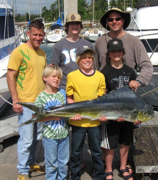 3-25-09
After a morning of watching the sharks and whales young Sam put the hurt on this nice Mahi Mahi. Way to go Sam!!
