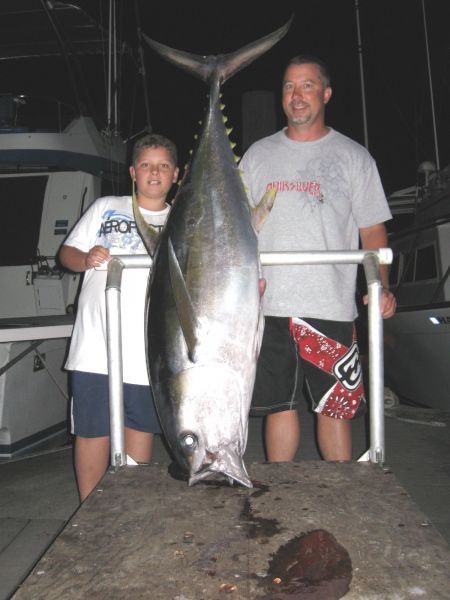 10-12-09
Ahi!! Nice fish for the Redfern men. Great story about the one tat got away after a 3 1/2 hour battle.
