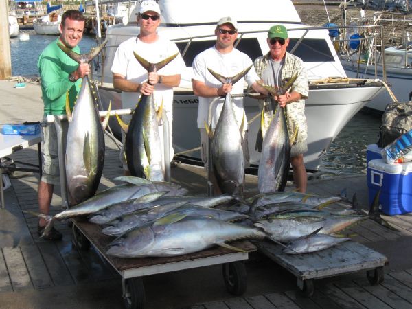 11-29-09
Andy, KJ, Kelley and Andy got a taste of the big water too. But, two cart loads of Yellowfin Tuna made it worth while. Nice work men.
