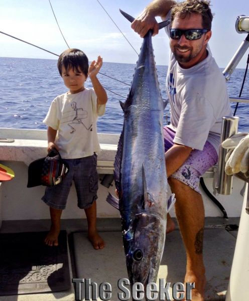 Big Fish, little kid
He cranked this one in from the fighting chair, with help from his Dad, Capt Chris Parker, The Seeker
Keywords: ono,wahoo,hawaii,north shore,charter,boat,fishing,trip,fish,oahu,sportfishing,ahi,mahi mahi,trolling