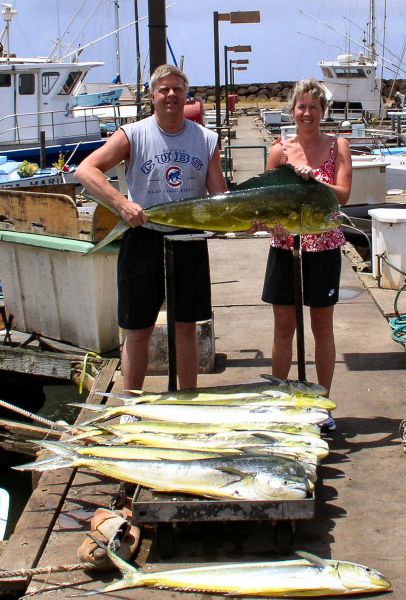Foxy Lady 5-5-06
Scott and Jill bounced around off  the north shore and were rewarded with 11 nice Mahi Mahi.  They earned every one of those fish, it was rough!
