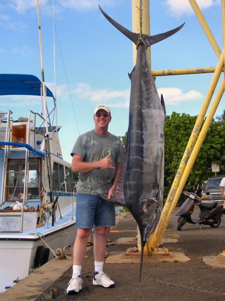 Foxy Lady 6-2-05
Summer's here!! 4th time's the charm for Steve and his hunt for a big one. A 210 pound Blue Marlin is a nice start for your billfish collection. Next stop... the Lake!
