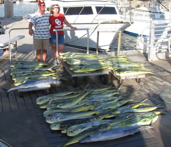 8-28-09
Larry and Kathy and a whole dock full of fish! 2 Ono's and 56 Mahi Mahi for almost 1000 pounds of fish. Very nice work folks.
