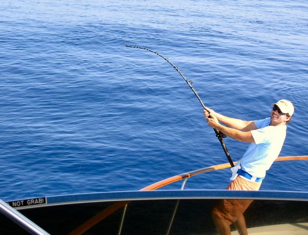 Why is our captain up on the bow with a rod all bent over?
Because there were just too many tunas around and he couldn't stand it any longer!!!
